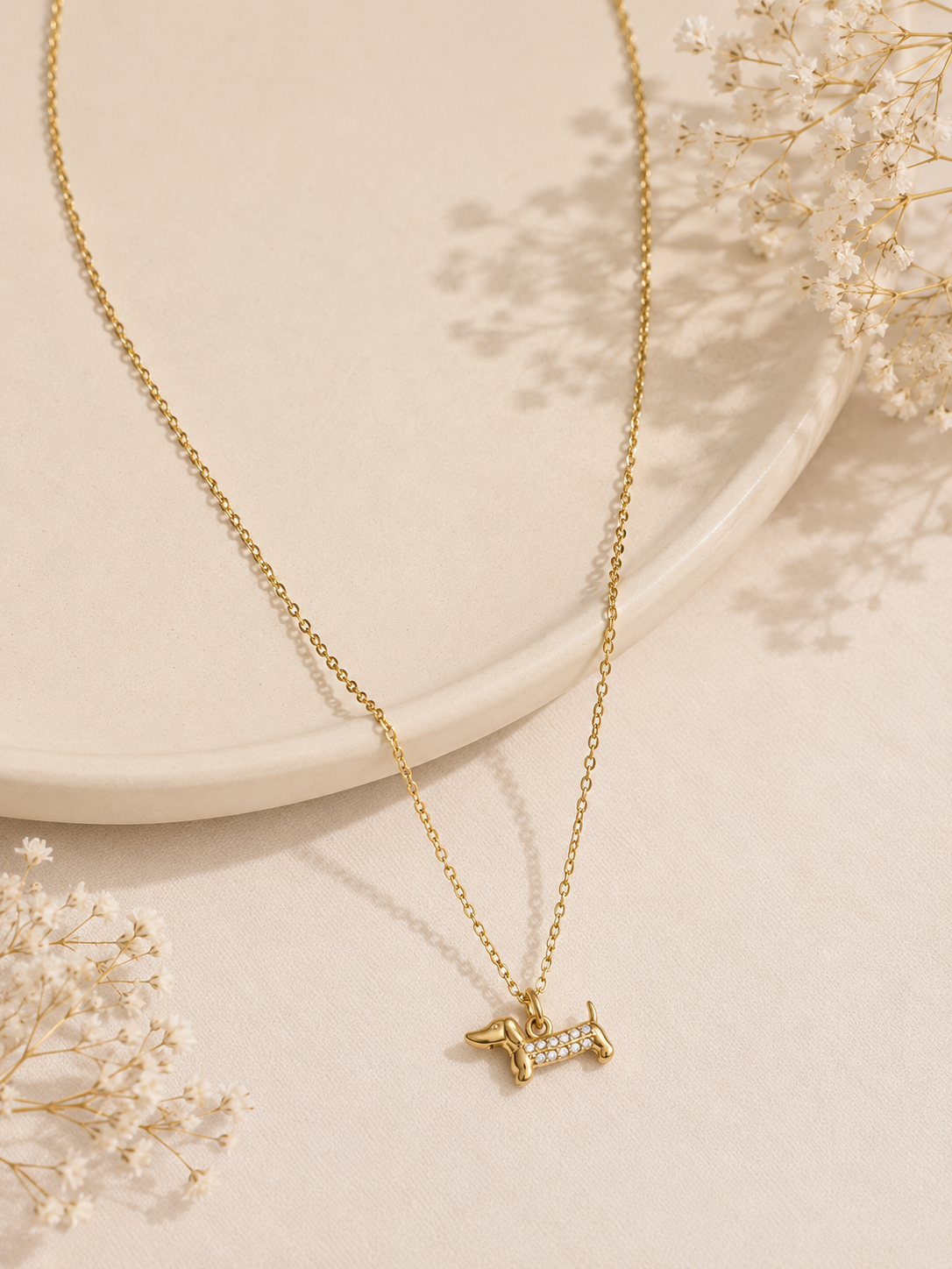 Collier July